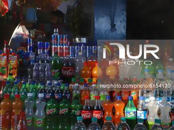 Cold drinks like Maaza, Cola Cola, Thumbs-up, Sprite, Real are displayed for sale at a shop in Jammu City, Jammu and Kashmir, India on 01 No...
