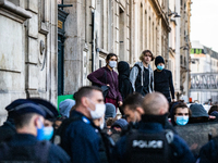 About one hundred high school students blocked the entry of their school in Paris, France, on November 3, 2020. Quickly the police came to u...