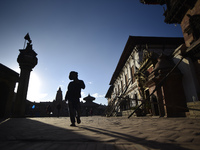 A Little kid playing around the Bhaktapur Durbar Square premises, Bhaktapur, Nepal on November 03, 2020. (
