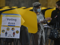 Voters cast their ballots at the polling place located within L.A.'s Union Station on Tuesday, November 3, 2020 in Los Angeles, California....