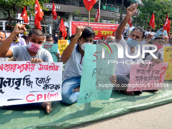 Actives of CPI(M) protest against the price hike of essential commodities in Guwahati, India on November 4, 2020. (