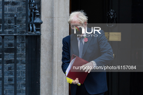  British Prime Minister Boris Johnson leaves 10 Downing Street for PMQs at the House of Commons on 04 November, 2020 in London. England is d...