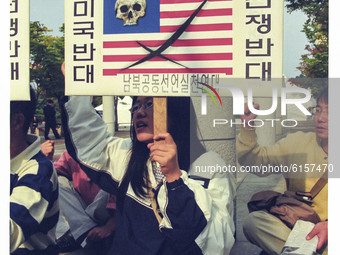 This Pictures taken date is 2003. A Protesters hold pickets and shout slogans during a  anti-war rally about South Korean government Iraq mi...