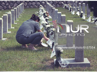 This Pictures taken date is 2000. Korean War dead family visit National Cemetery after cherish in Seoul, South Korea. The Seoul National Cem...