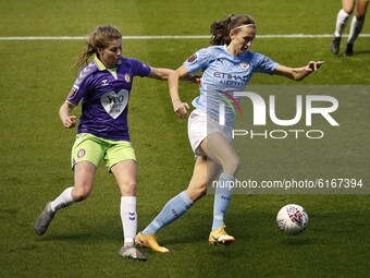 Citys Gill Scott holds off Bristols Emma Bissell during the Barclays FA Women's Super League match between Manchester City and Bristol City...