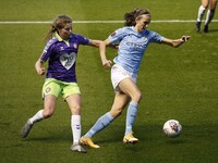 Citys Gill Scott holds off Bristols Emma Bissell during the Barclays FA Women's Super League match between Manchester City and Bristol City...