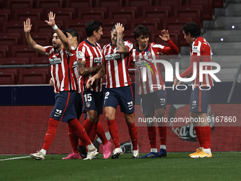 Joao Felix of Atletico Madrid celebrates after scoring his sides first goal during the La Liga Santader match between Atletico de Madrid and...