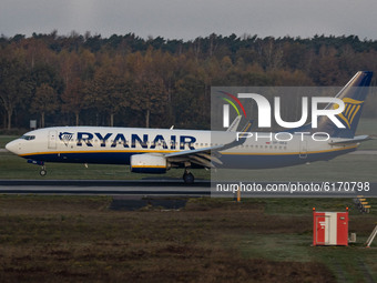 A Ryanair Boeing 737-800 aircraft as seen on final approach flying, touching down and taxiing in Eindhoven EIN EHEH Airport in the Netherlan...