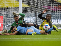   Ben Foster of Watford, Christian Kabasele of Watford during the Sky Bet Championship match between Watford and Coventry City at Vicarage R...
