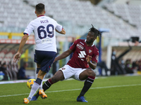 Arkadiusz Reca of FC Crotone and Soualiho Meit of Torino FC during the Serie A football match between Torino FC and Crotone FC at Olympic Gr...