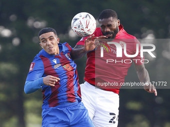  L-R Hamza Kaid of Maldon and Tiptree and Yann Songo'o of Morecambe FC during FA Cup First Round between Maldon and Tiptree and Morecambe FC...