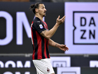 Zlatan Ibrahimovic of AC Milan reacts during the Serie A match between AC Milan and Hellas Verona FC at Stadio Giuseppe Meazza on November 8...