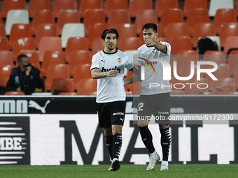 Carlos Soler of Valencia celebrates after scoring his sides first goal during the La Liga Santader match between Valencia CF and Real Madrid...