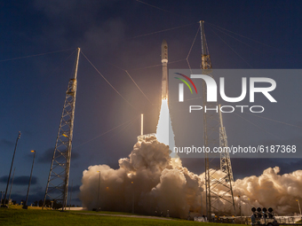 A remote camera inside the launch pad capture the moments a ULA Atlas V rocket lift off from Pad 41 at the Cape Canaveral Air Force Base for...