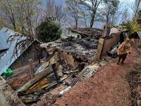 A man inside his house which was damaged due to border shelling in Balkote area of Hajipir in Uri sector, of Baramulla, Jammu and Kashmir, I...