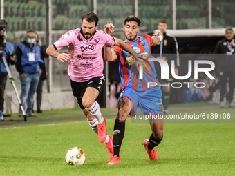 Alberto Almici and Reginaldo during the Serie C match between Palermo FC and Catania, at the stadium Renzo Barbera of Palermo. Italy, Sicily...