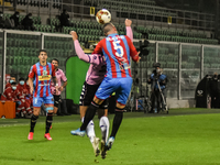 Alberto Almici and Tommaso Silvestri during the Serie C match between Palermo FC and Catania, at the stadium Renzo Barbera of Palermo. Italy...