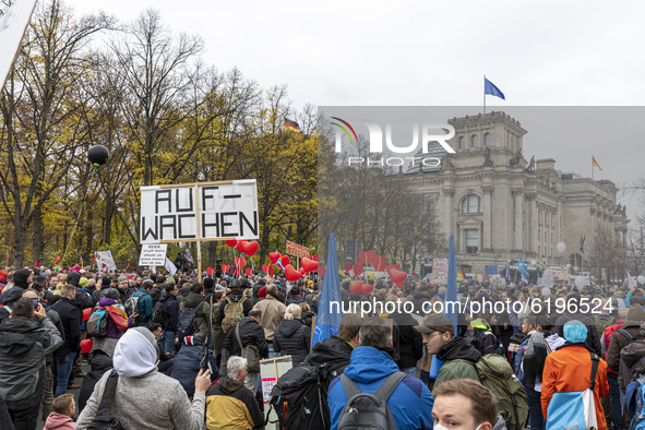 People take part in a demonstration against the Coronavirus regulations in Berlin, Germany, on November 18, 2020. The riot police used tearg...