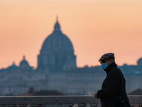 People walks in Rome, Italy, on November 20, 2020 amid the Covid-19 pandemic. (