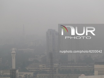 A high angle views of a part of Dhaka city as fog weather is seen over the city in Bangladesh on November 21, 2020. (
