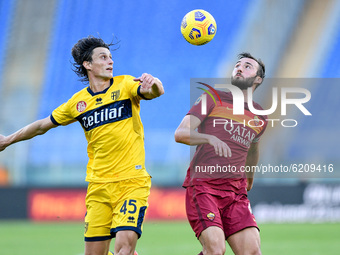 Roberto Inglese of Parma Calcio 1913 and Bryan Cristante of AS Roma compete for the ball during the Serie A match between AS Roma and Parma...
