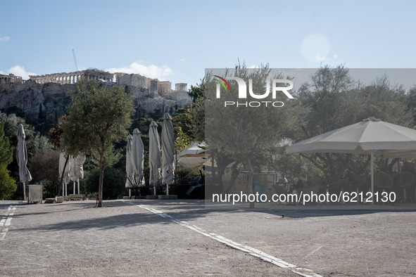 A closed cafe with the Acropolis from behind in Athens, Greece on November 23, 2020 during the second COVID-19 lockdown in Greece.  