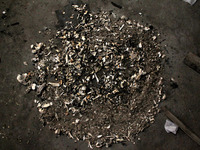 A pile of ash and physical remains of Covid-19 victims left after cremation, at Nigambodh Ghat crematorium, on November 23, 2020 in New Delh...