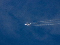 Emirates Airbus A380 double-decker aircraft as seen fly at 40.000 feet over the Netherlands. The largest passenger plane in the world, the w...