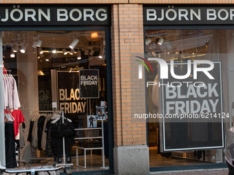 Black Friday signs with sale as seen in the front display window of a shop in Eindhoven city center.  Daily life in Eindhoven the Netherland...