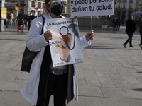 Doctors protest in Puerta del Sol in downtown Madrid, spain, 24 November 2020, during the second day of their indefinite strike to protest a...