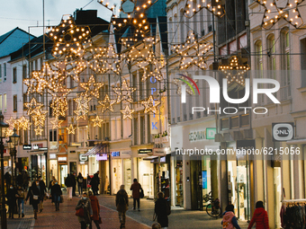Christmas lights are seen in the city center of Bonn, Germany, on November 24, 2020.  (
