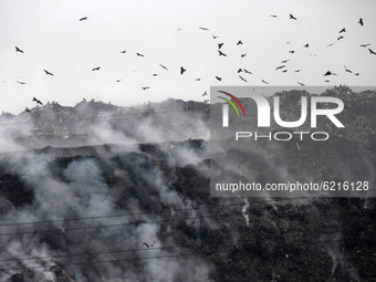 A view of smoke billowing after a fire broke out at east Delhi's Ghazipur landfill in New Delhi on November 25, 2020. Air quality monitoring...