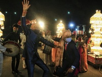 Jaipur: A groom's relatives dance  during his wedding procession, amid the ongoing coronavirus pandemic, in Jaipur, Rajasthan,India, Wednesd...