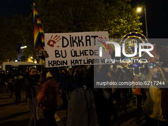 Activists of womens rights hold banner as they protest the violence against women in front Kadikoy Square, istanbul on November 25, 2020. Th...
