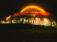Lanxess Arena is illuminated in orange to mark the international day for the Elimination of Violence against women, in Cologne, Germany, on...