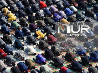 Muslims prostrate as they perform Friday congregational prayers with social distancing in Srinagar, Kashmir on November 27, 2020. Jammu and...