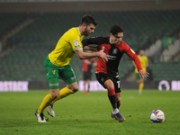 Coventrys Callum O' Hare and Norwichs Grant Hanley during the Sky Bet Championship match between Norwich City and Coventry City at Carrow Ro...