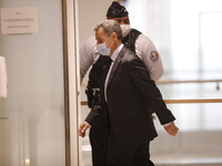 EX-President Nicolas Sarkozy arrives at his trial on corruption charges at Paris' courthouse on November 30, 2020. Prosecutors say Sarkozy p...