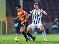 Gianluca Lapadula of Benevento Calcio and Matthijs de Ligt of Juventus FC compete for the ball during the Serie A match between Benevento Ca...
