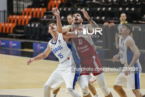 13 Dominik Olejniczak of Poland and 15 Jake Cohen of Israel during the FIBA EuroBasket 2022 Qualifiers match of group A between Israel and P...