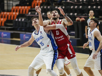 13 Dominik Olejniczak of Poland and 15 Jake Cohen of Israel during the FIBA EuroBasket 2022 Qualifiers match of group A between Israel and P...