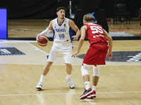 99 Yiftah Ziv of Israel defended by 55 Lukasz Koszarek of Poland during the FIBA EuroBasket 2022 Qualifiers match of group A between Israel...