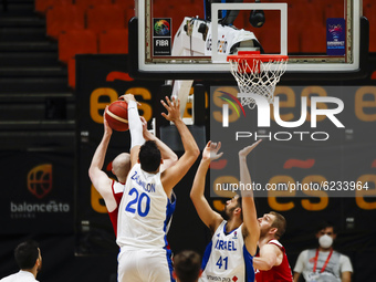 20 Ida Zalmanson of Israel blocking 77 Damian Kulig of Poland during the FIBA EuroBasket 2022 Qualifiers match of group A between Israel and...