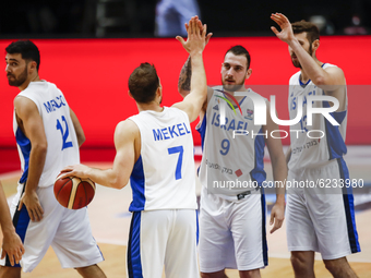 07 Gal Mekel of Israel celebrating the victory with 09 Golan Gutt of Israel and 13 Dominik Olejniczak of Poland during the FIBA EuroBasket 2...