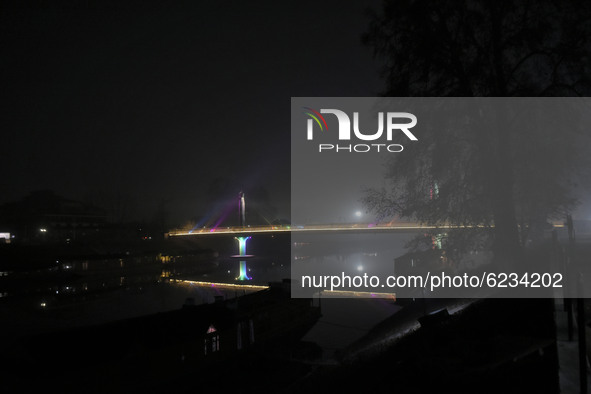 Illuminated view of a bridge over jehlum river in Srinagar, Indian Administered Kashmir on 30 November 2020. 