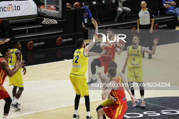03 Francisco Alonso of Spain defended by 12 Bogdan Popa of Romania during the FIBA EuroBasket 2022 Qualifiers match of group A between Spain...