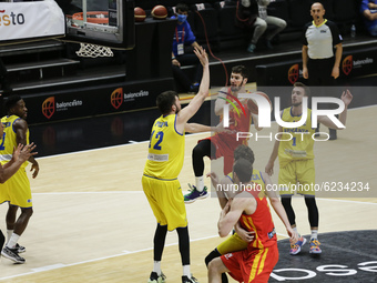 03 Francisco Alonso of Spain defended by 12 Bogdan Popa of Romania during the FIBA EuroBasket 2022 Qualifiers match of group A between Spain...