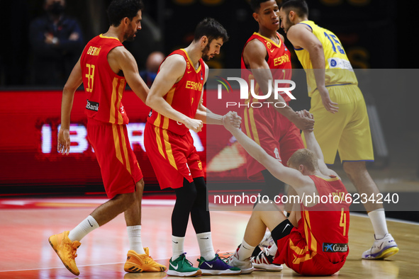 Spanish player helping 04 Alberto Diaz of Spain during the FIBA EuroBasket 2022 Qualifiers match of group A between Spain and Romania at Pab...