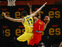 12 Bogdan Popa of Romania and 01 Jose Miguel Perez Balbuena of Spain during the FIBA EuroBasket 2022 Qualifiers match of group A between Spa...