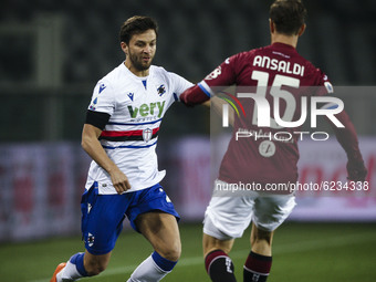 Sampdoria defender Bartosz Bereszynski (24) fights for the ball against Torino defender Cristian Ansaldi (15) during the Serie A football ma...